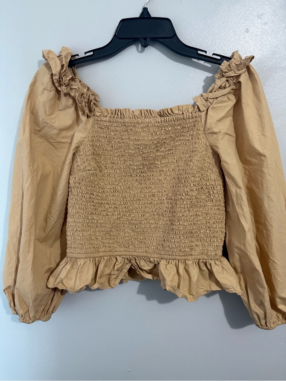 Cotton Smocked Off-Shoulder Peasant Top with Ruffle Hem in Tan